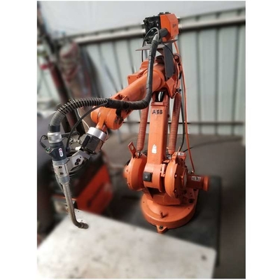 6 Axis Robotic Arm ABB IRB 1410 พร้อมสถานีทําความสะอาดปืน CNGBS สําหรับอัตโนมัติหุ่นยนต์ปั่น