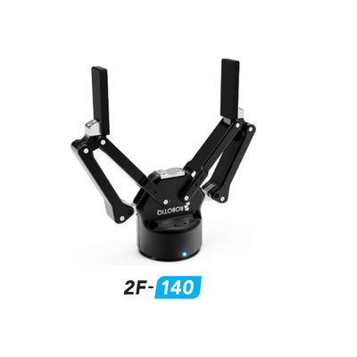 Adaptive Gripper Robotiq 2F-140 ทำงานสำหรับการป้อนเครื่องจักรและการประกอบเครื่องยนต์โดยใช้ Cobot เป็นมือจับ